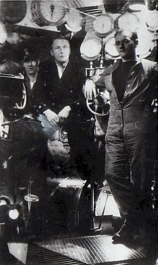 C W Burn in engine room of HMS Sharpshooter